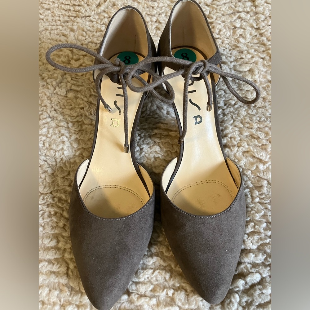 Brown suede heels.
